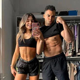 Fit couple showing off there abs