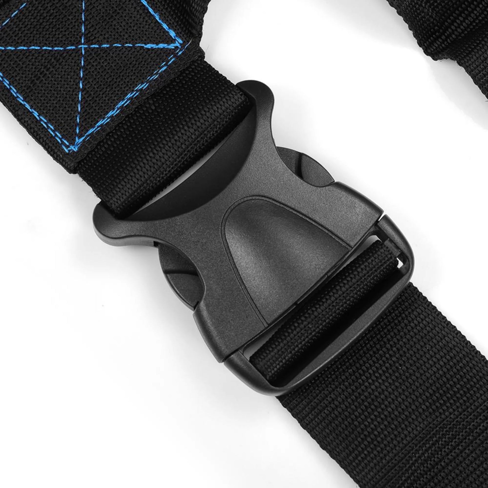 Close-up of quick-release plastic buckle on speed running training sled vest used for secure fastening and adjustable resistance training fit during sprint and strength workouts