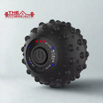 The Fitness Hut Recovery Ball™ massage ball on grey background with shadow detail